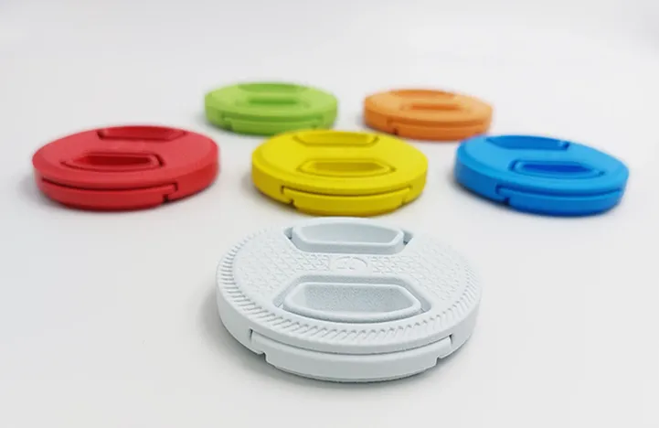 3D printed camera cover in white, yellow, blue, red, green and orange