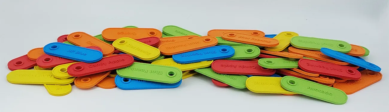 3D printed colored chips in green, blue, orange, red, and yellow